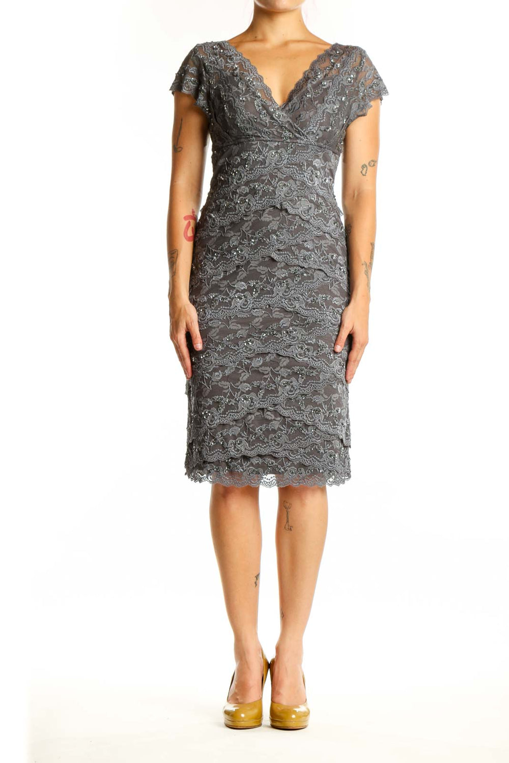 Gray lace wrap cocktail dress with flutter sleeves and ruched detailing, front view