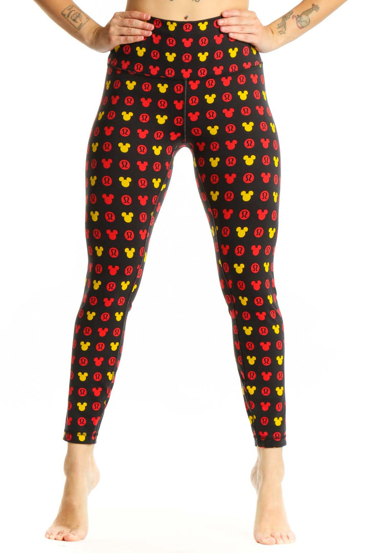 Front view of multicolor Mickey Mouse print Lululemon leggings in size S with high-waisted design