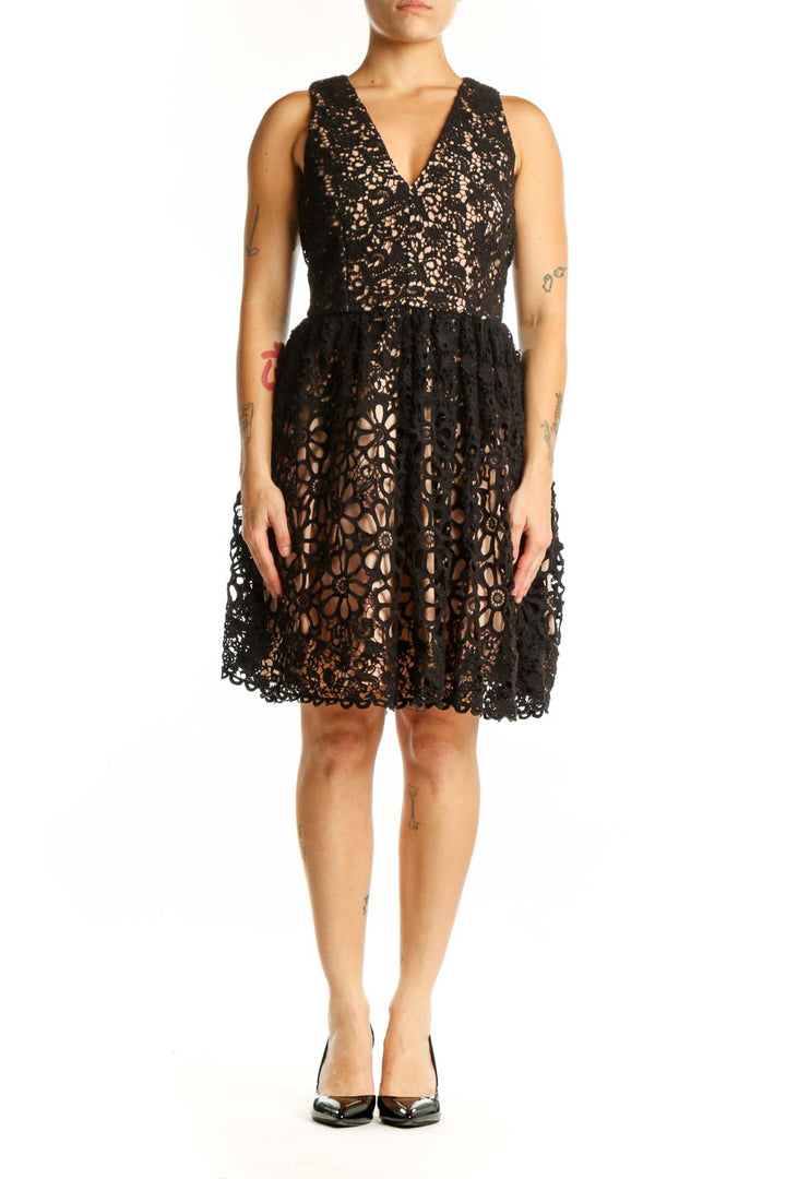 Black lace wrap dress with floral cutout details and V-neckline, front view