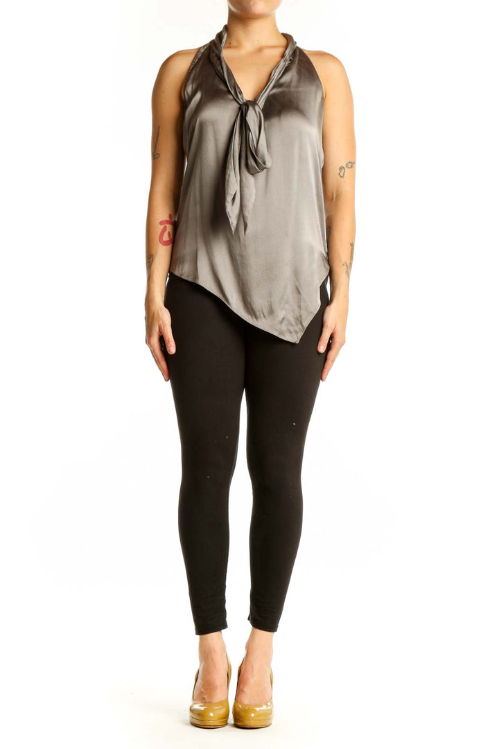 Gray silk halter tank top with tie-neck design and asymmetrical hemline, front view