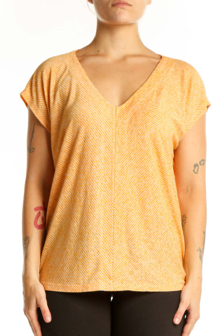 Gold striped V-neck short sleeve top from LOFT, size L, front view showing horizontal striping pattern and relaxed fit