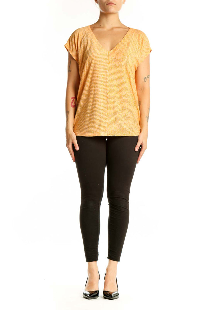 Gold striped V-neck short sleeve top from LOFT, size L, front view showing horizontal striping pattern and relaxed fit