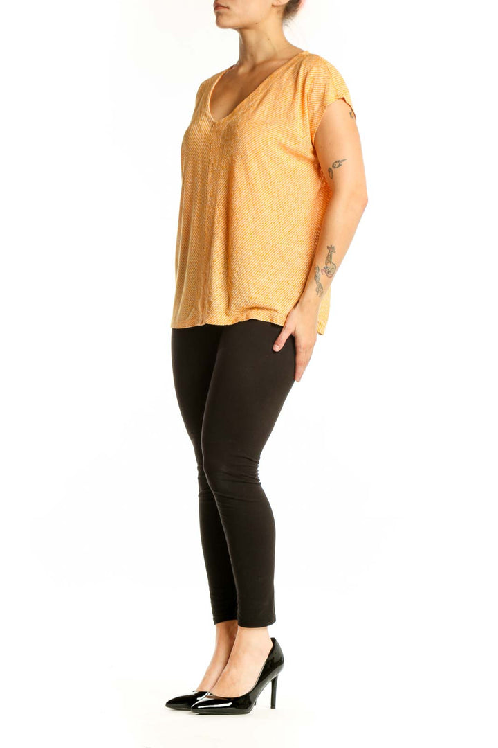 Gold striped V-neck short sleeve top from LOFT, size L, front view showing horizontal striping pattern and relaxed fit