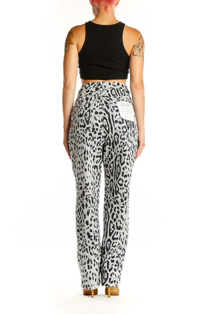 Back view of white and black leopard print denim jeans by Good American, size XXL, showing flattering high-waisted silhouette