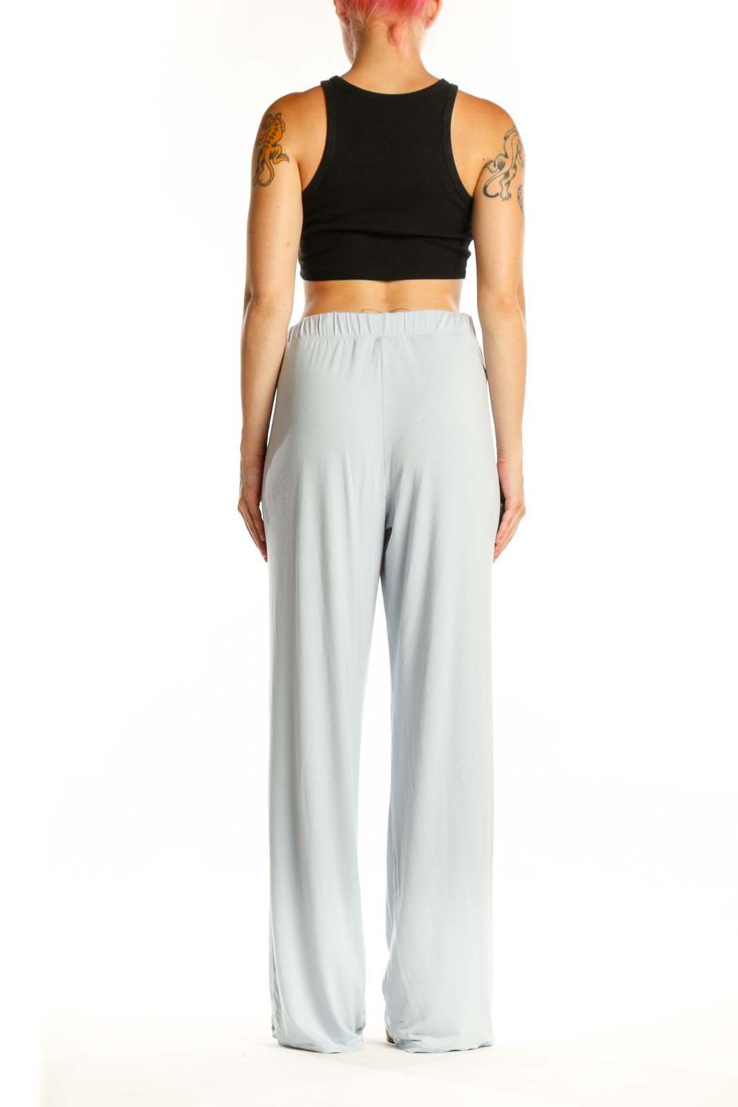 Gray wide leg pants back view, showing relaxed fit and draping silhouette