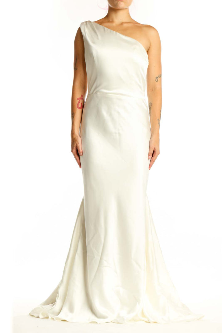 Cream one-shoulder mermaid evening dress with asymmetrical neckline and dramatic floor-length skirt