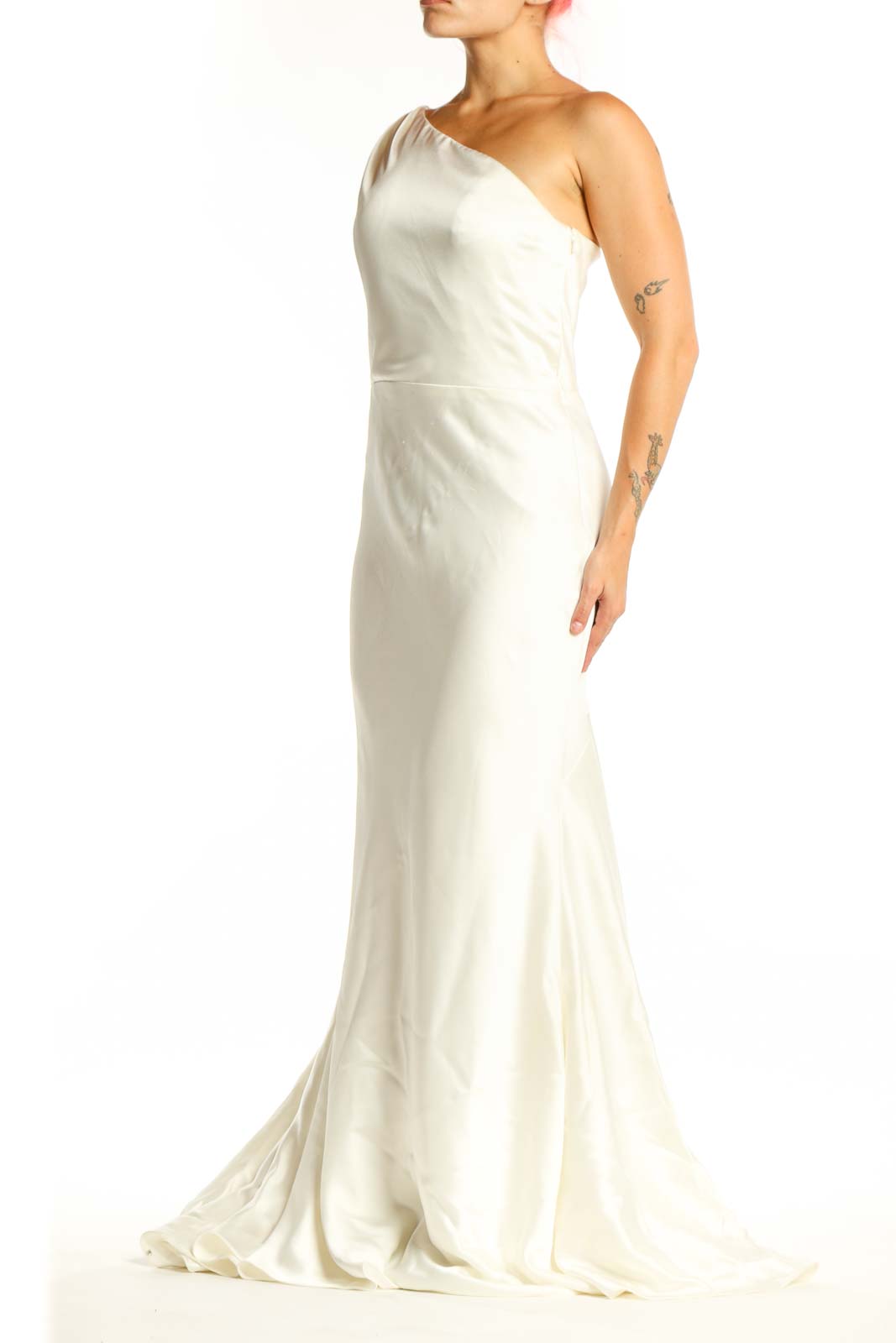 Cream one-shoulder mermaid evening dress with asymmetrical neckline and dramatic floor-length skirt