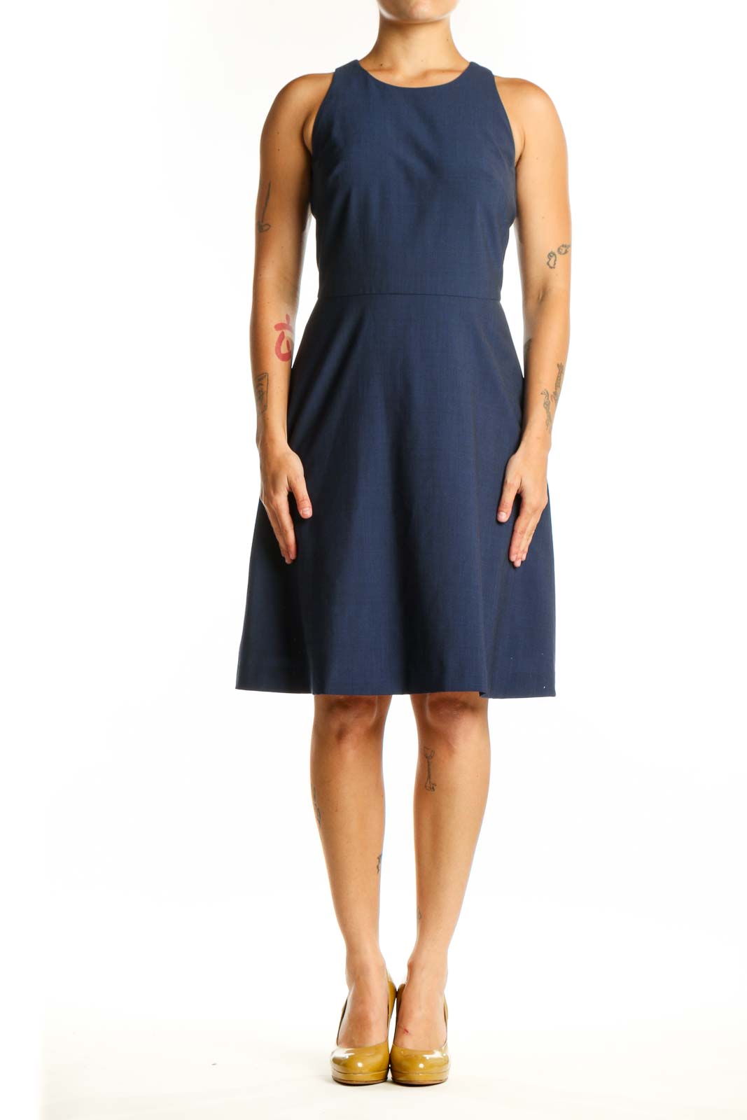 Navy sleeveless A-line dress with crew neckline, front view on model