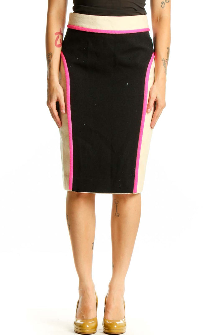Black pencil skirt with neon pink and cream vertical colorblock stripes, front view