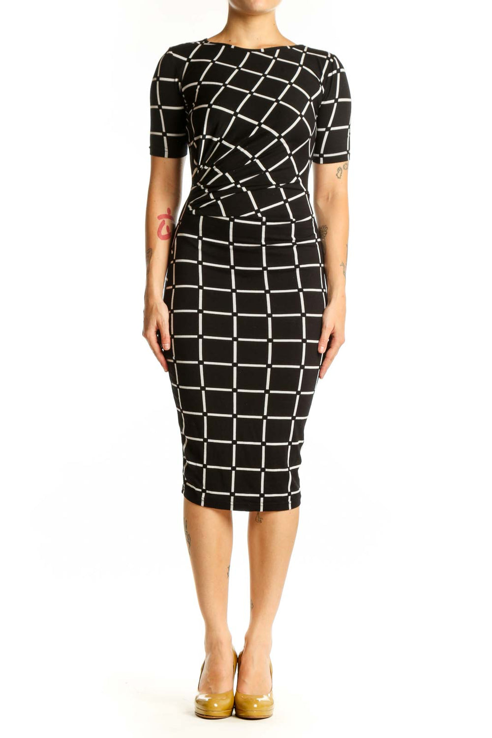 Black and white grid pattern midi dress with short sleeves and ruched waist detail, front view
