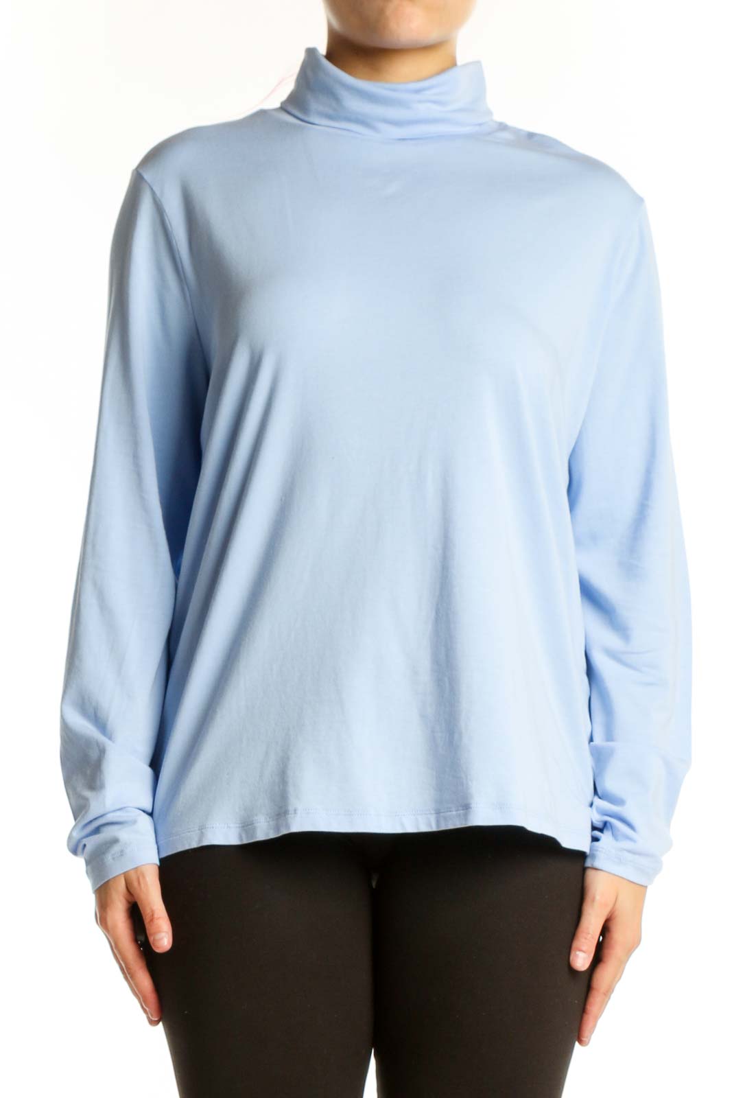Light blue turtleneck long sleeve top from Lands' End, front view on model wearing black pants