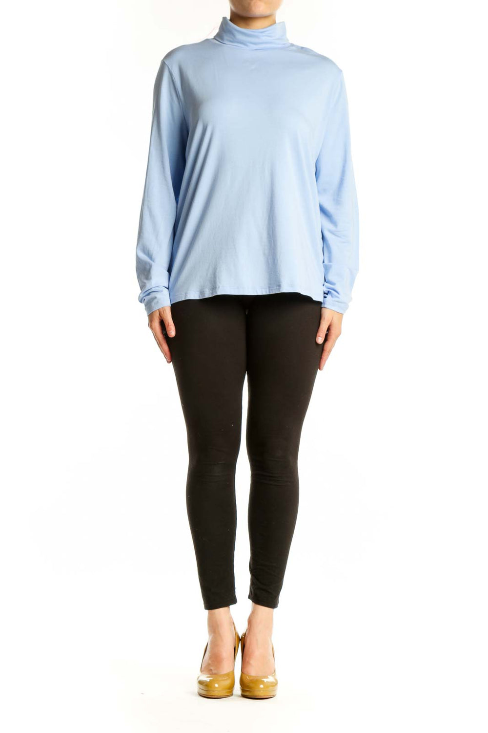 Light blue turtleneck long sleeve top from Lands' End, front view on model wearing black pants