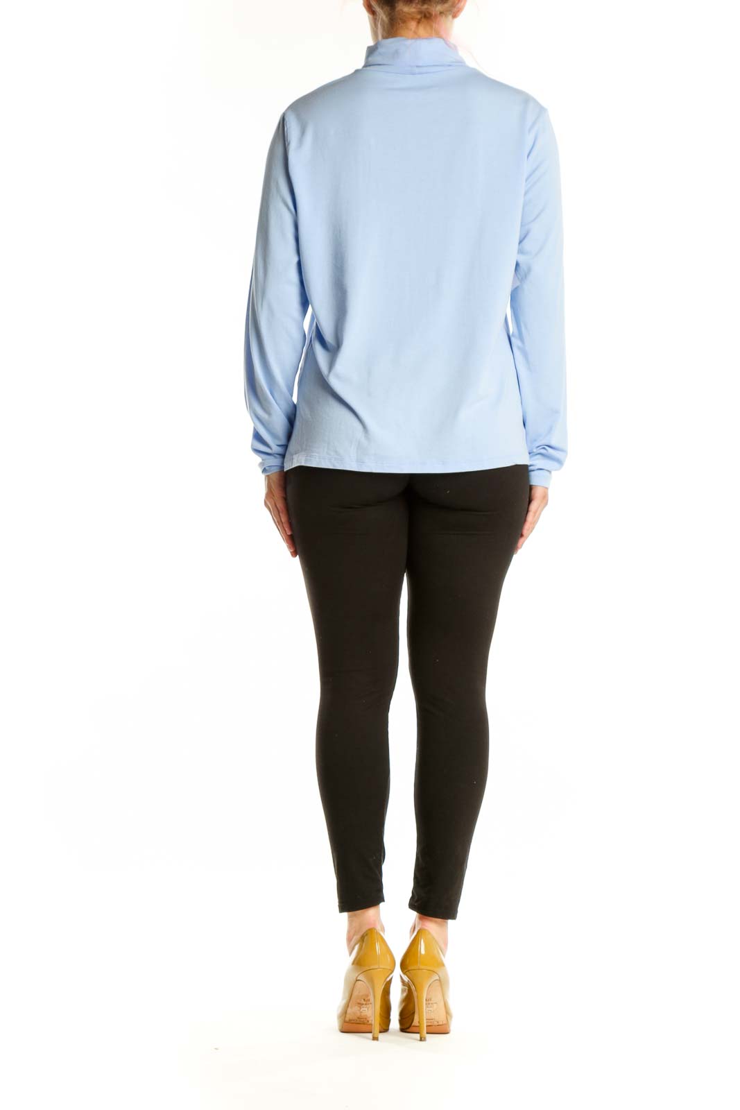 Light blue turtleneck long sleeve top from Lands' End, back view on model wearing black pants and yellow heels