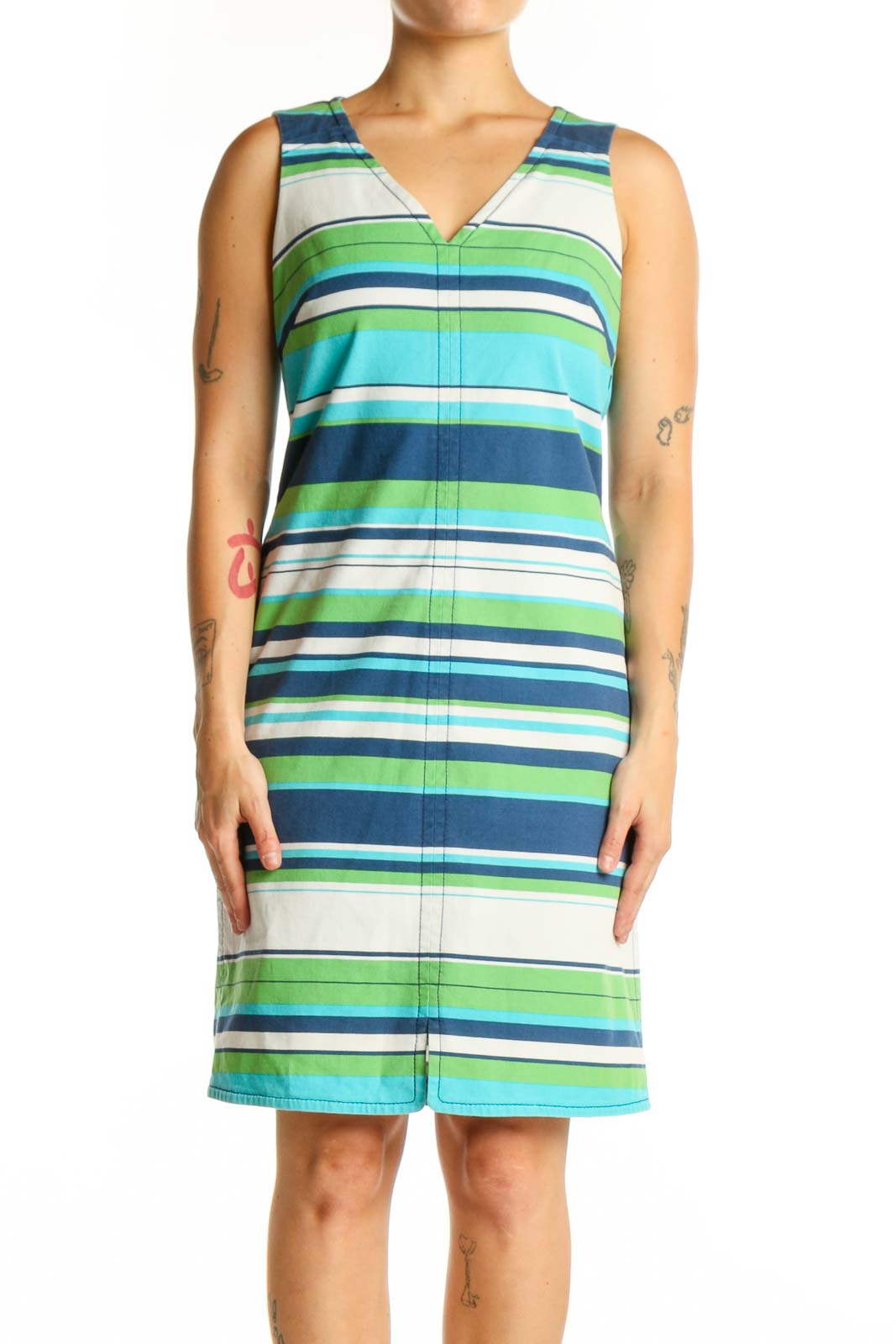 Front view of multicolor striped cotton dress with V-neckline and sleeveless design in navy, green, turquoise, and white stripes