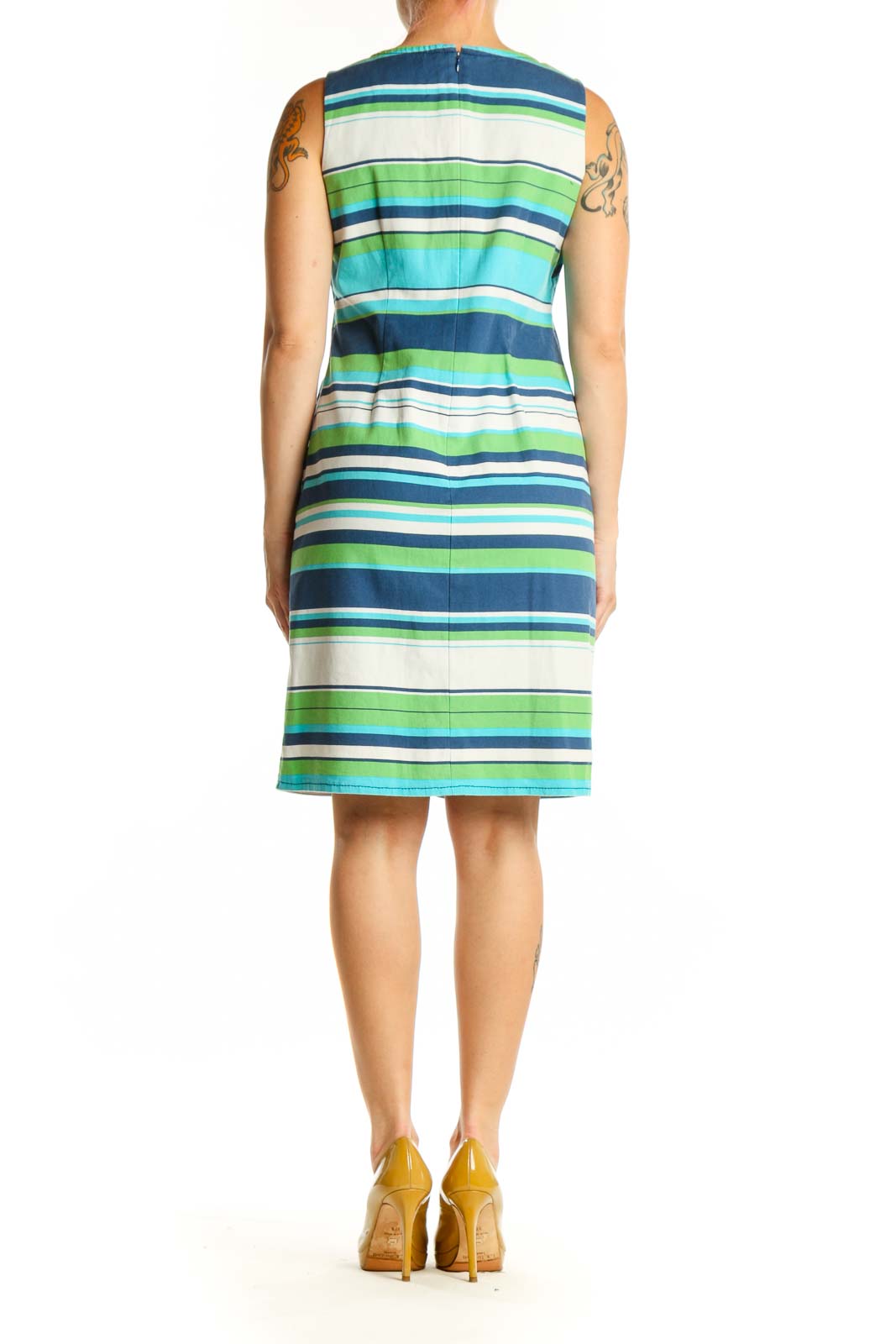 Back view of multicolor striped cotton dress showing sleeveless design and knee-length cut with horizontal stripe pattern