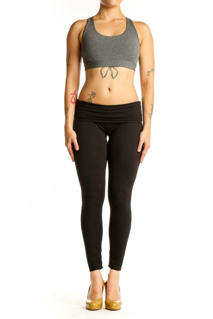 Gray Athleta Racerback Sports Bra with scoop neckline, front view on model