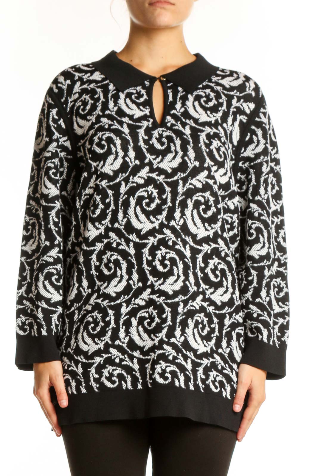 Black and white baroque patterned Karl Lagerfeld Paris pullover top with keyhole neckline and ribbed trim, front view