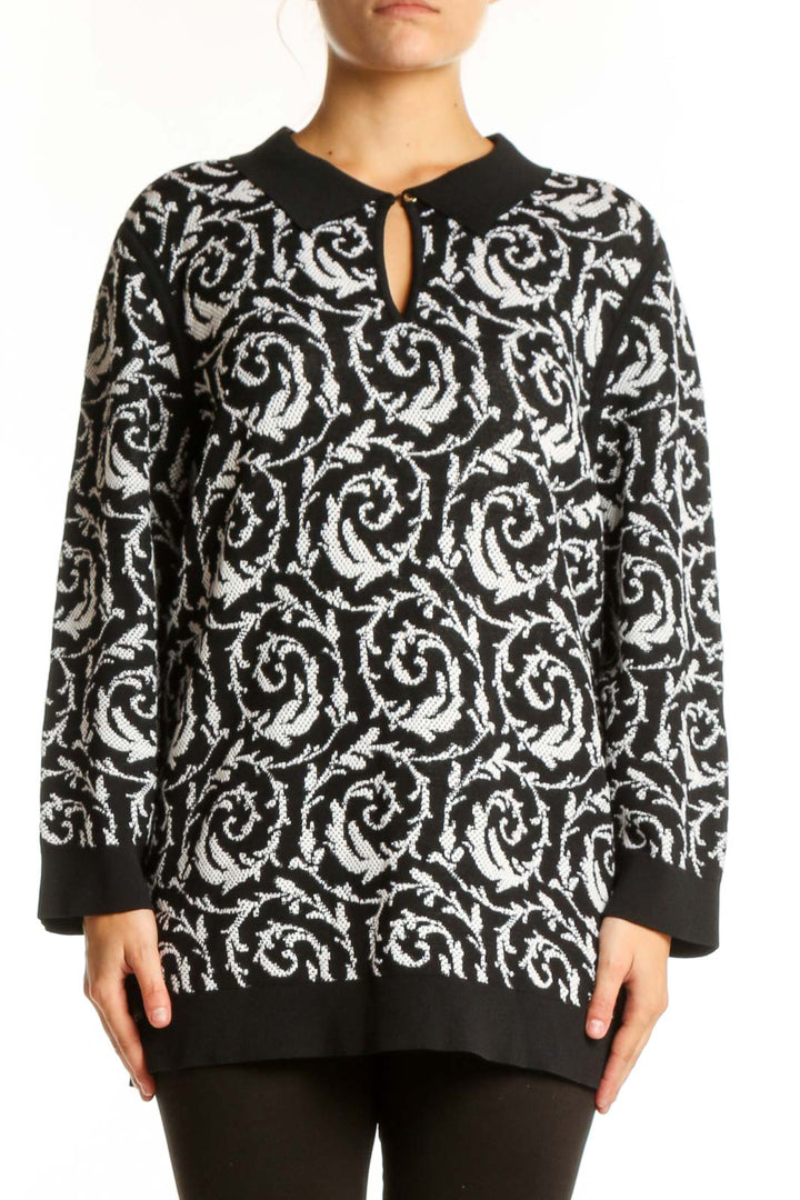 Black and white baroque patterned Karl Lagerfeld Paris pullover top with keyhole neckline and ribbed trim, front view