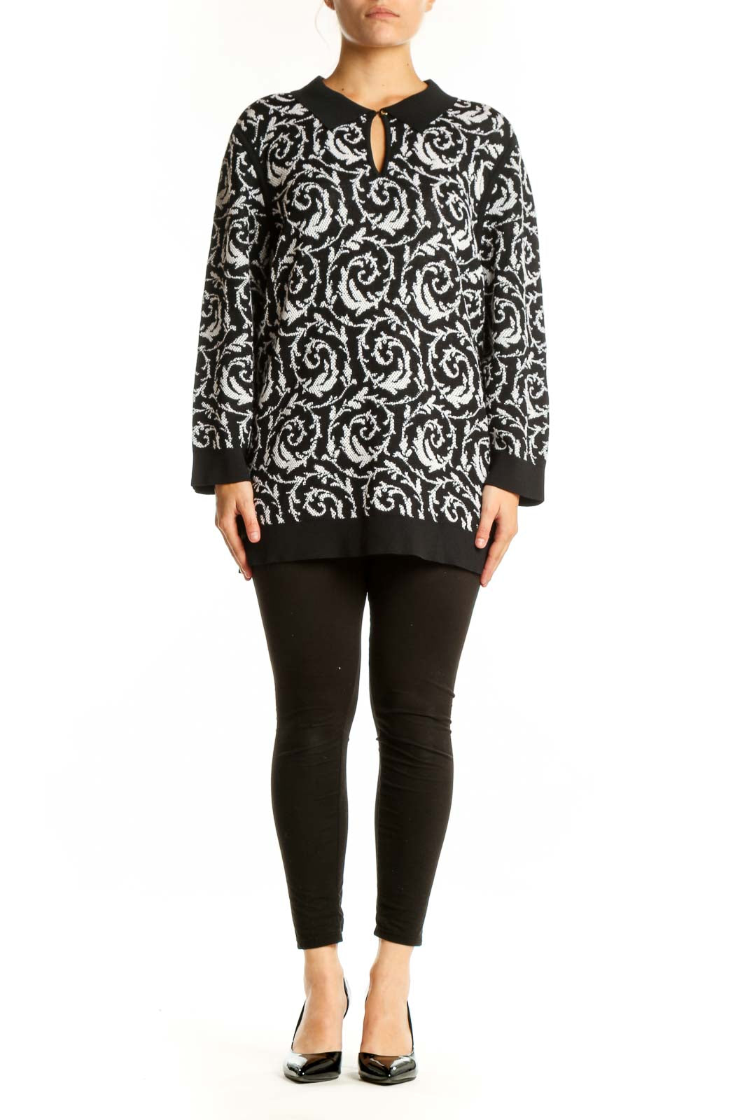 Black and white baroque patterned Karl Lagerfeld Paris pullover top with keyhole neckline and ribbed trim, front view