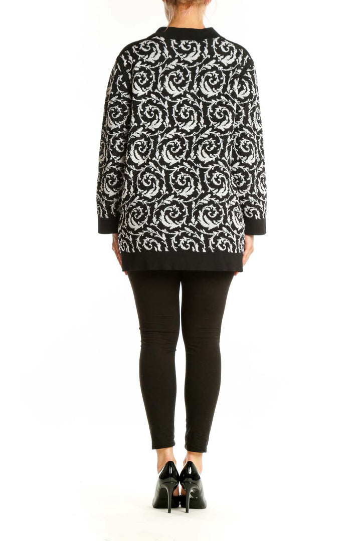 Black and white baroque patterned Karl Lagerfeld Paris pullover top with ribbed cuffs and hem, back view