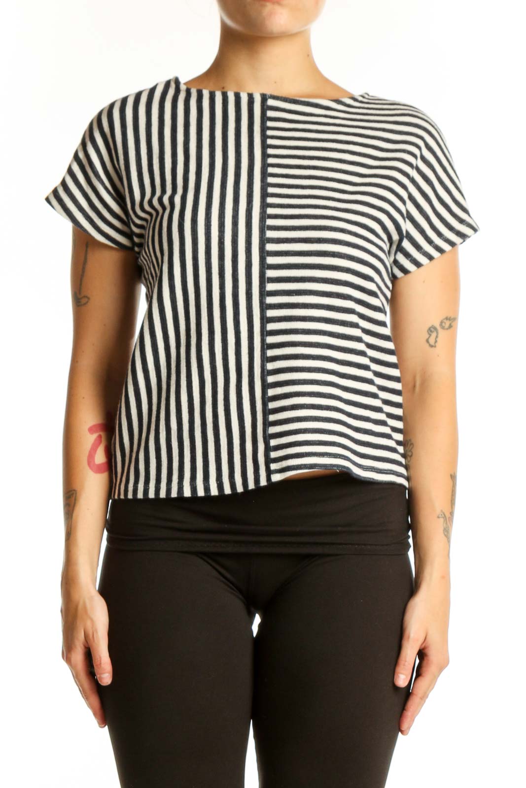 Navy and white striped short sleeve top with mixed vertical and horizontal stripe pattern, front view