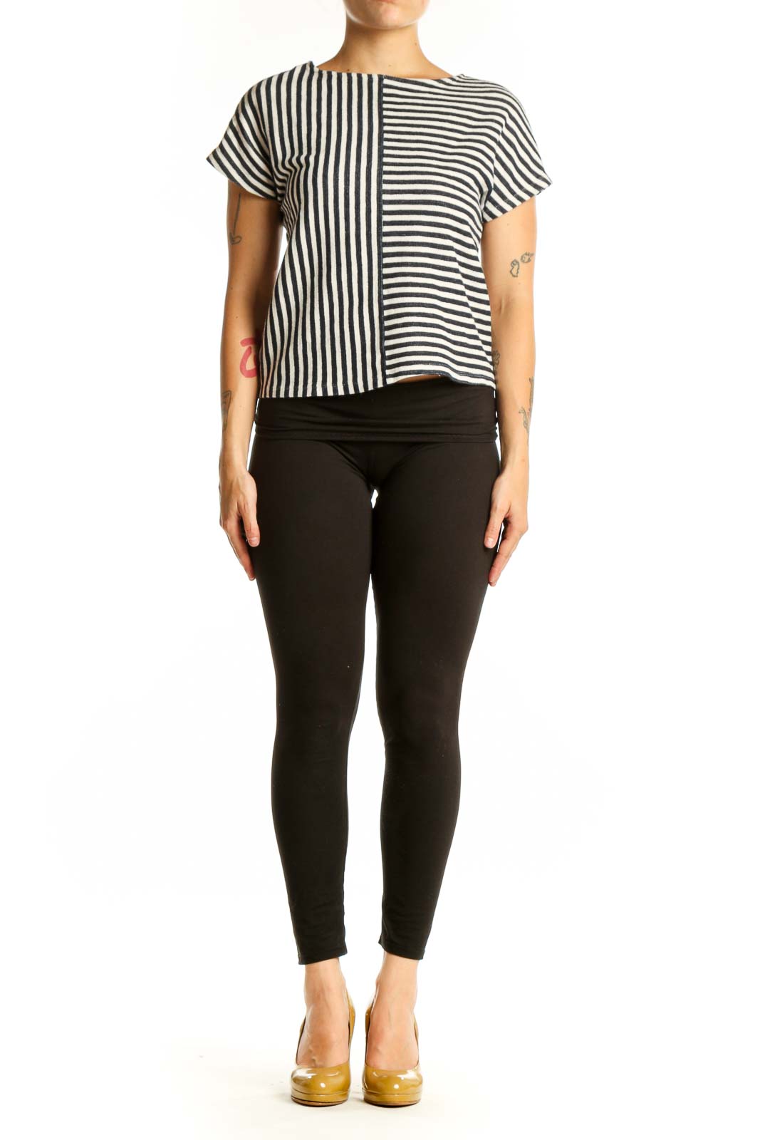 Navy and white striped short sleeve top with mixed vertical and horizontal stripe pattern, front view