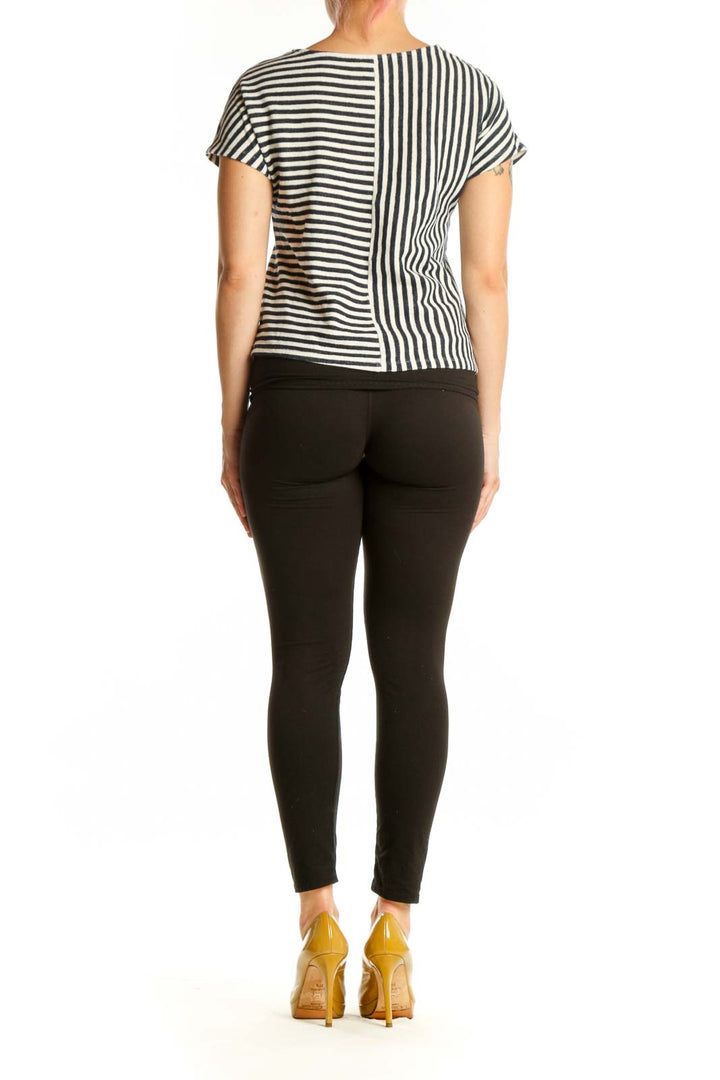 Navy and white striped short sleeve top back view showing horizontal stripe design