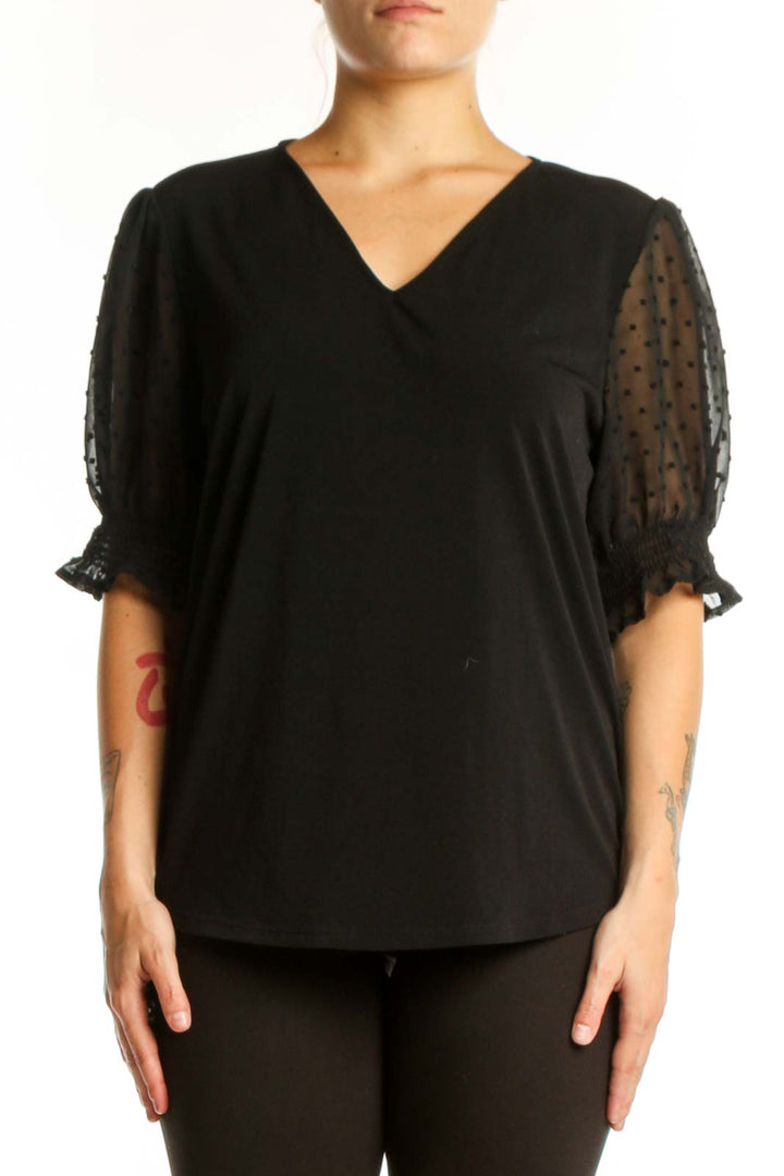 Black V-neck puff sleeve top with dotted mesh details by Adrianna Papell, front view