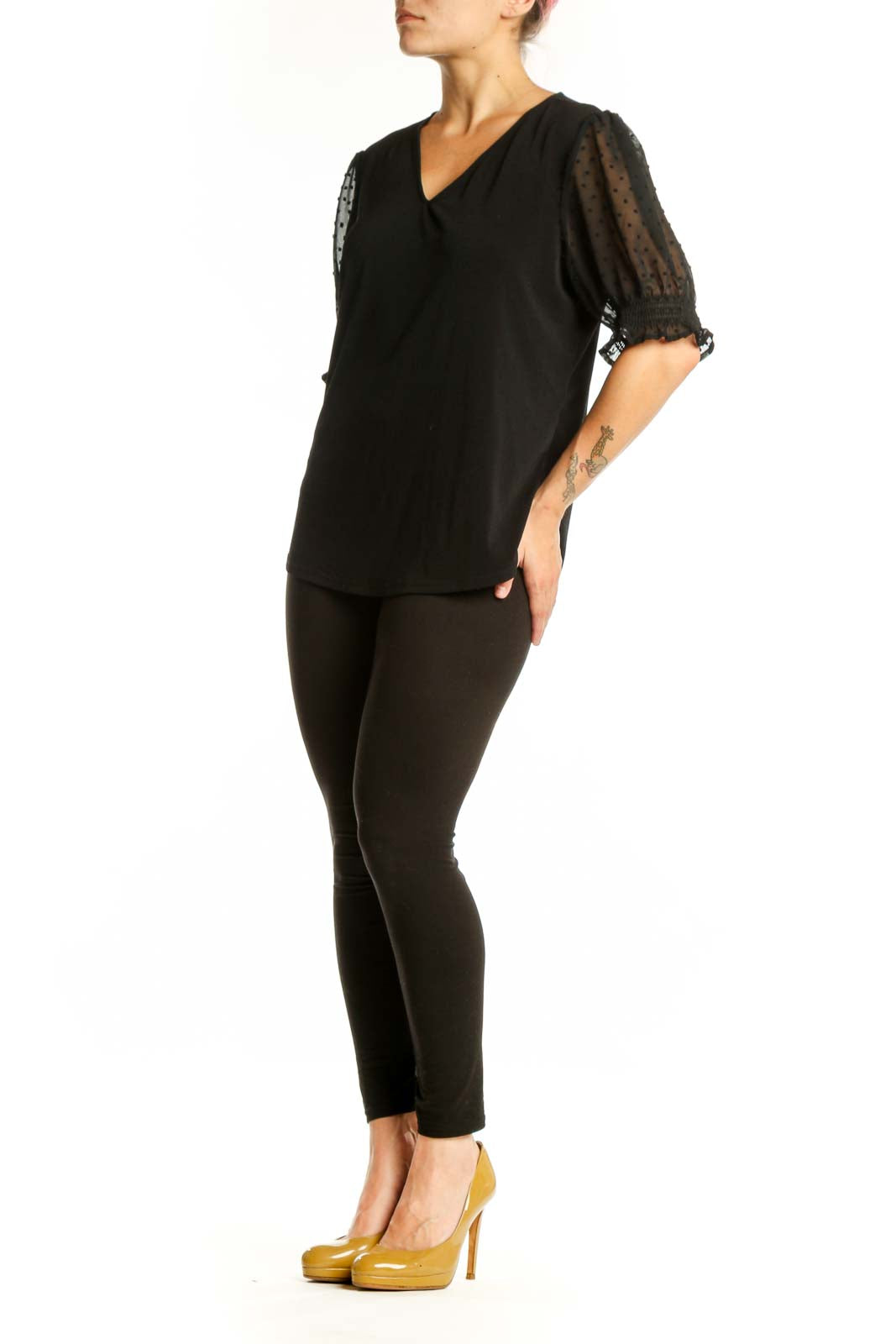 Black V-neck puff sleeve top with dotted mesh details by Adrianna Papell, front view