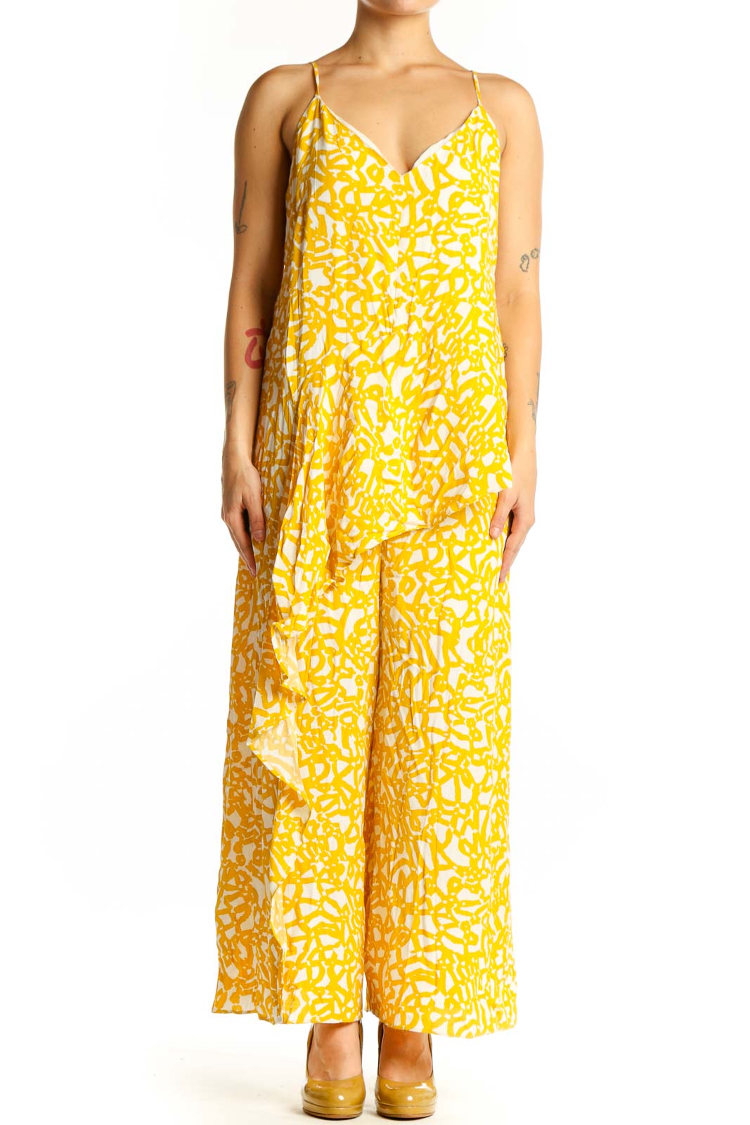 Front view of yellow abstract print Maeve all-in-one jumpsuit with V-neckline and spaghetti straps
