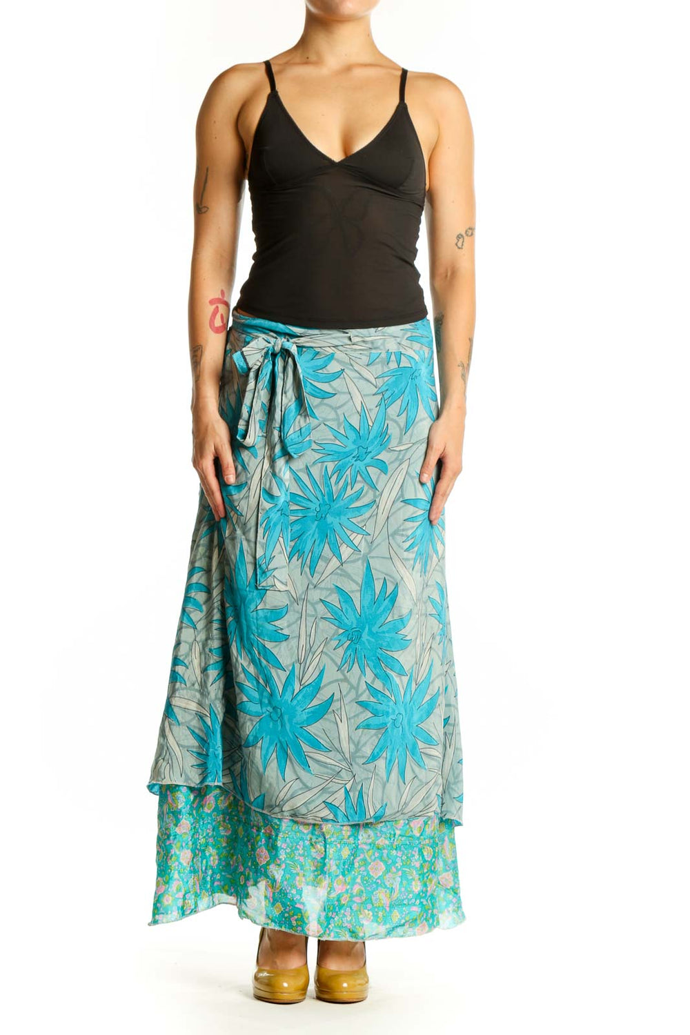 Turquoise and cream floral wrap maxi skirt with layered design and adjustable tie waist, front view