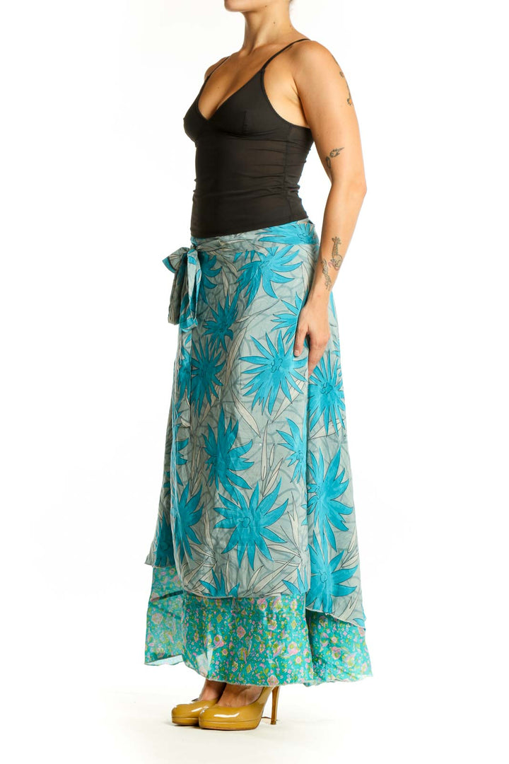 Turquoise and cream floral wrap maxi skirt with layered design and adjustable tie waist, front view