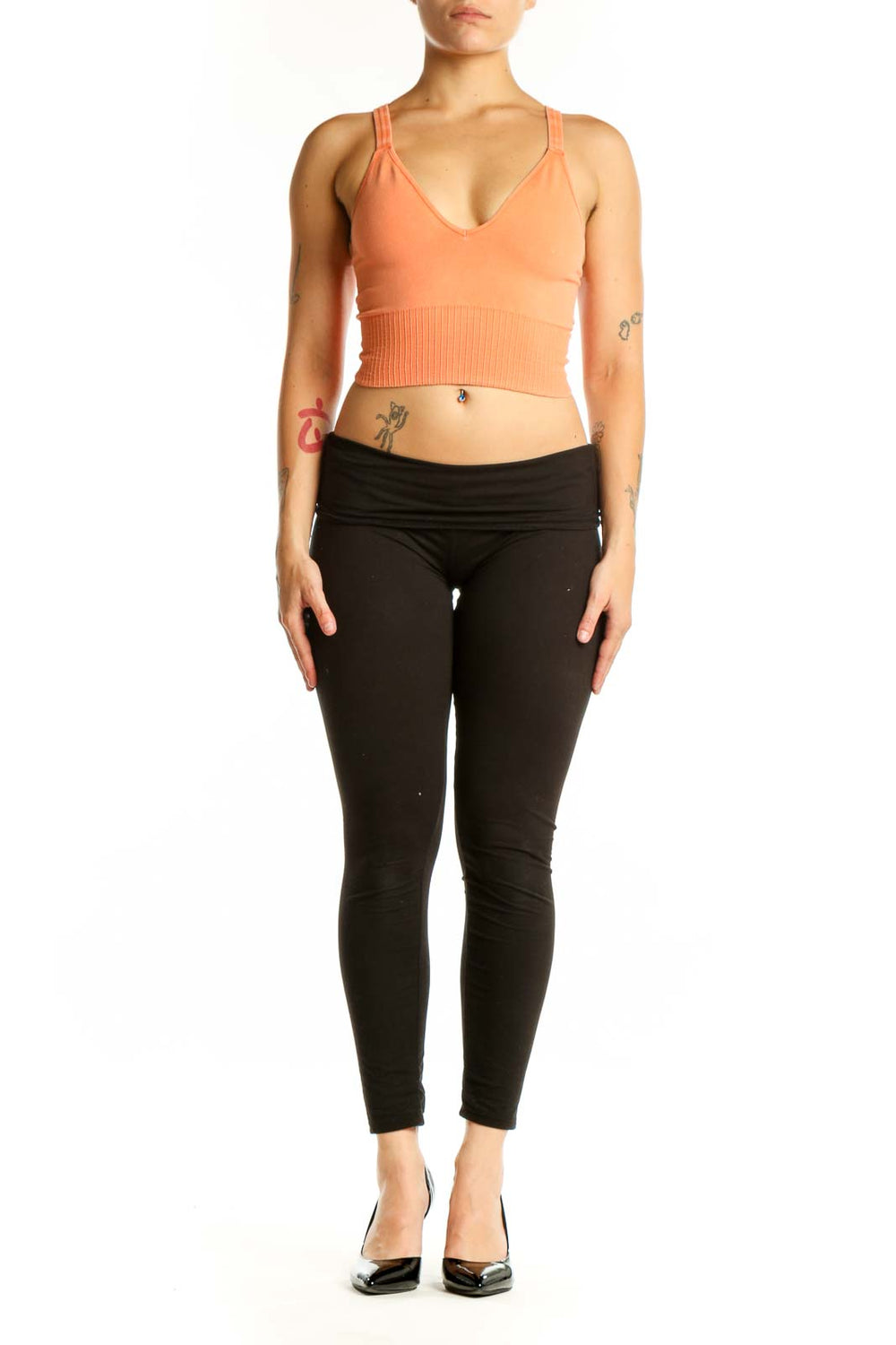 Peach ribbed crop tank top with V-neckline and ribbed midsection detail, front view