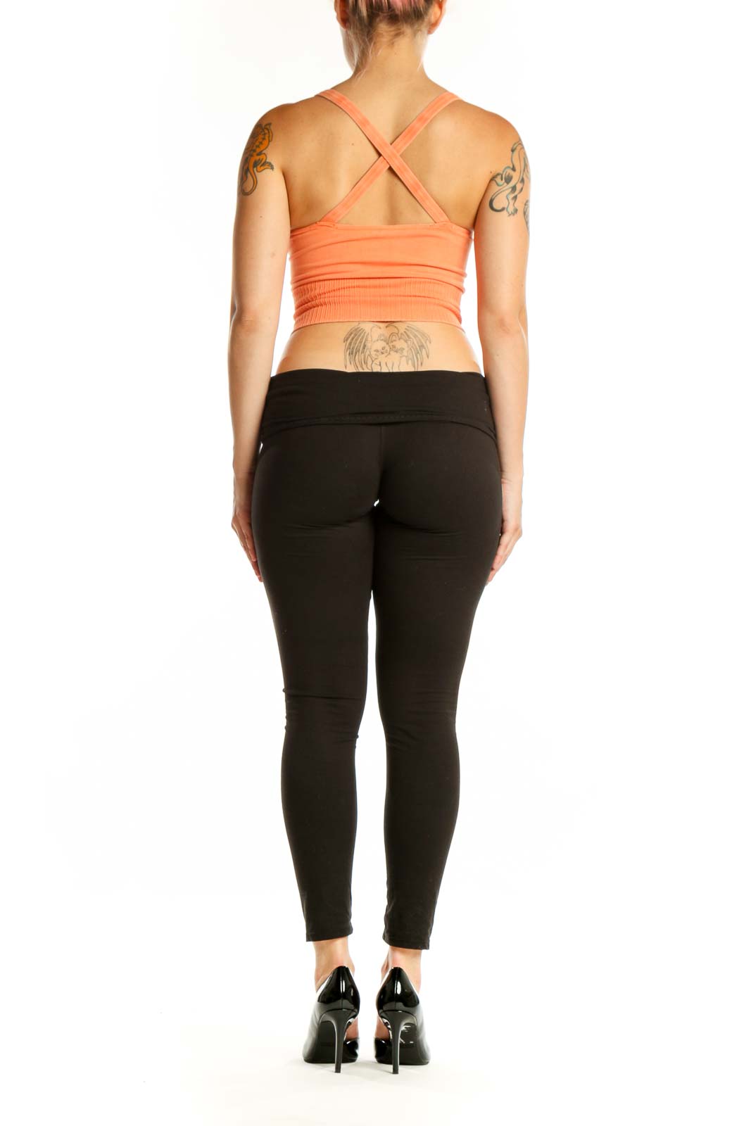Peach ribbed crop tank top back view showing sleek design and fit