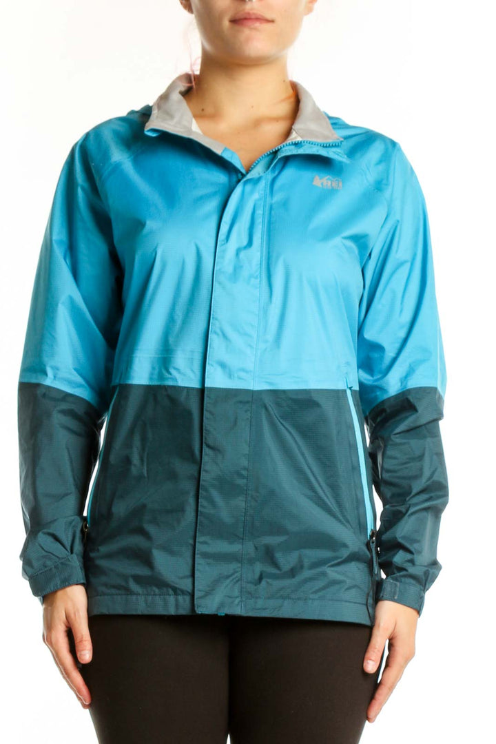 Blue and teal colorblock nylon windbreaker jacket front view with full-zip closure and gray collar lining
