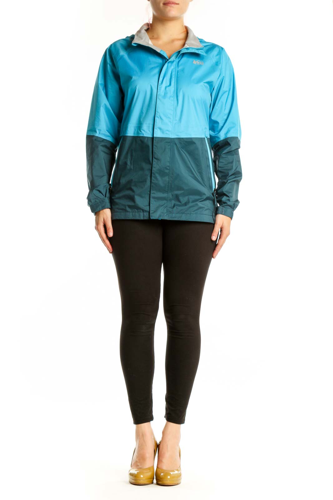 Blue and teal colorblock nylon windbreaker jacket front view with full-zip closure and gray collar lining