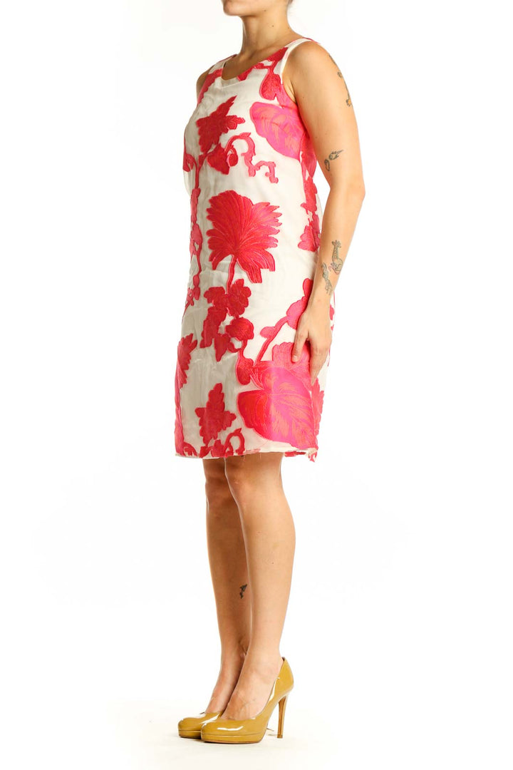 Red and pink floral print A-line dress with sleeveless crew neck design, front view