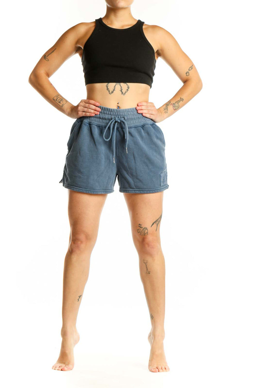 Blue denim activewear shorts with drawstring waistband and cargo pockets, front view