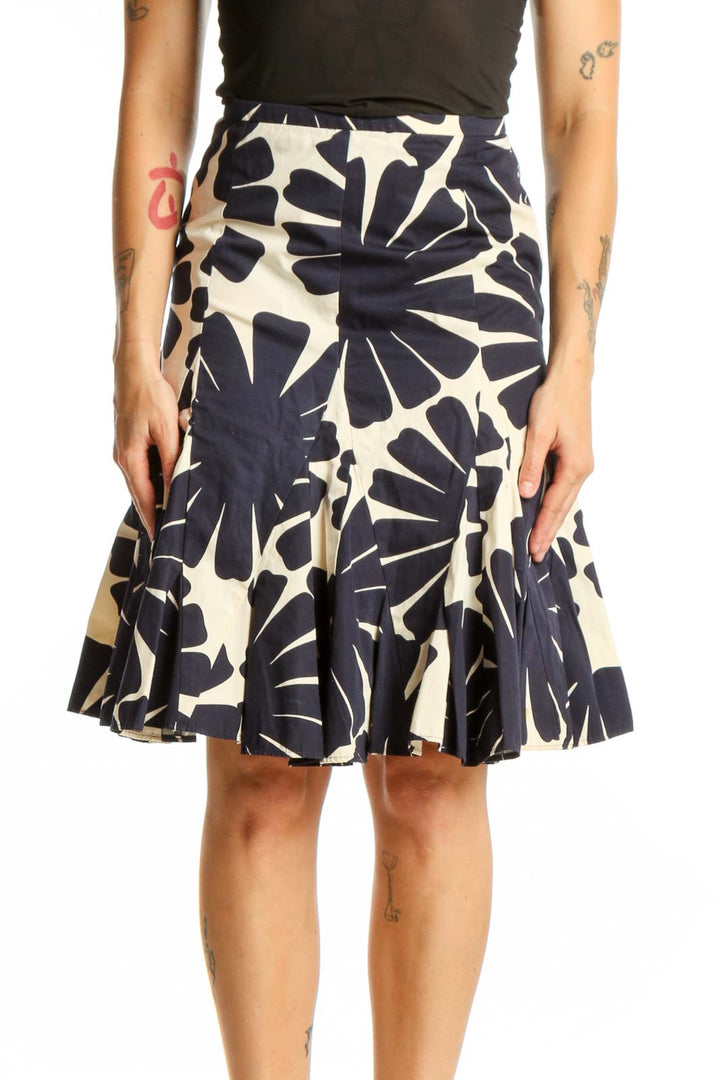 Navy and cream floral A-line skirt with geometric print, front view on model