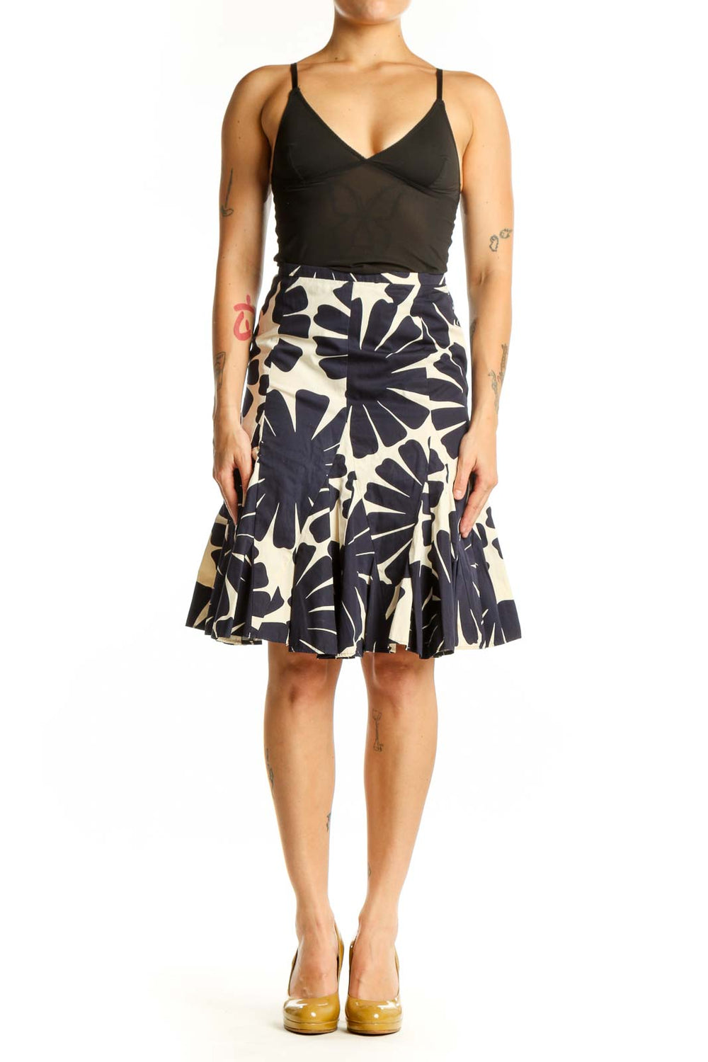 Navy and cream floral A-line skirt with geometric print, front view on model