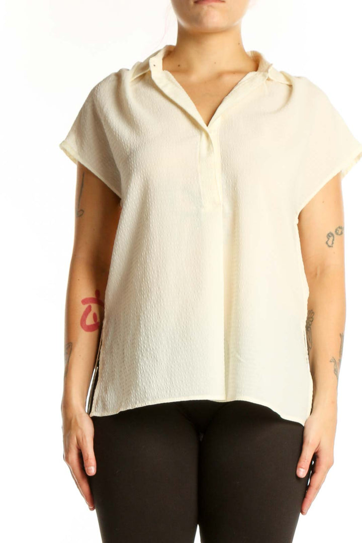 Cream collared short sleeve blouse by Max Studio, front view showing button-front closure and relaxed fit