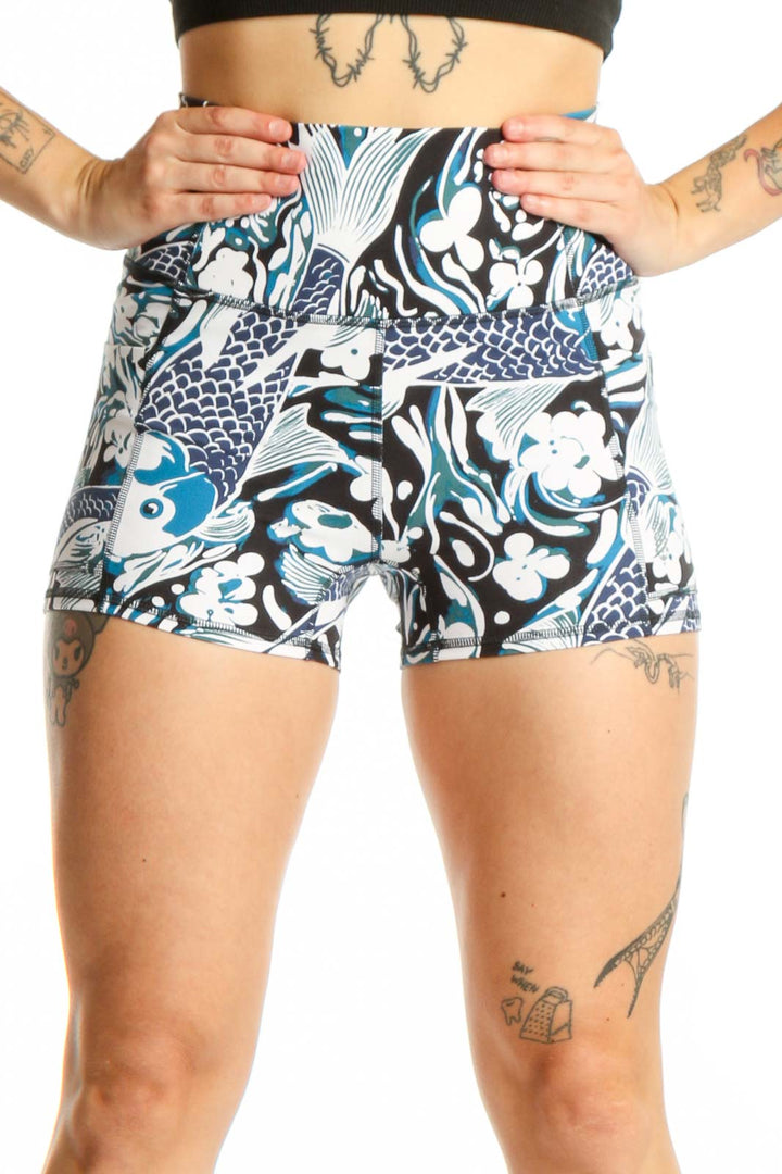 Multicolor abstract print athletic shorts front view showing bold navy, white, and teal organic pattern design