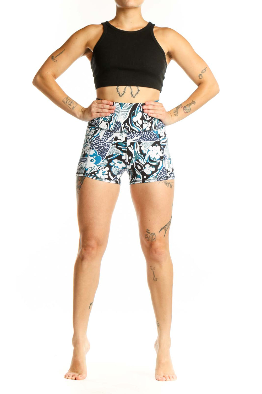 Multicolor abstract print athletic shorts front view showing bold navy, white, and teal organic pattern design