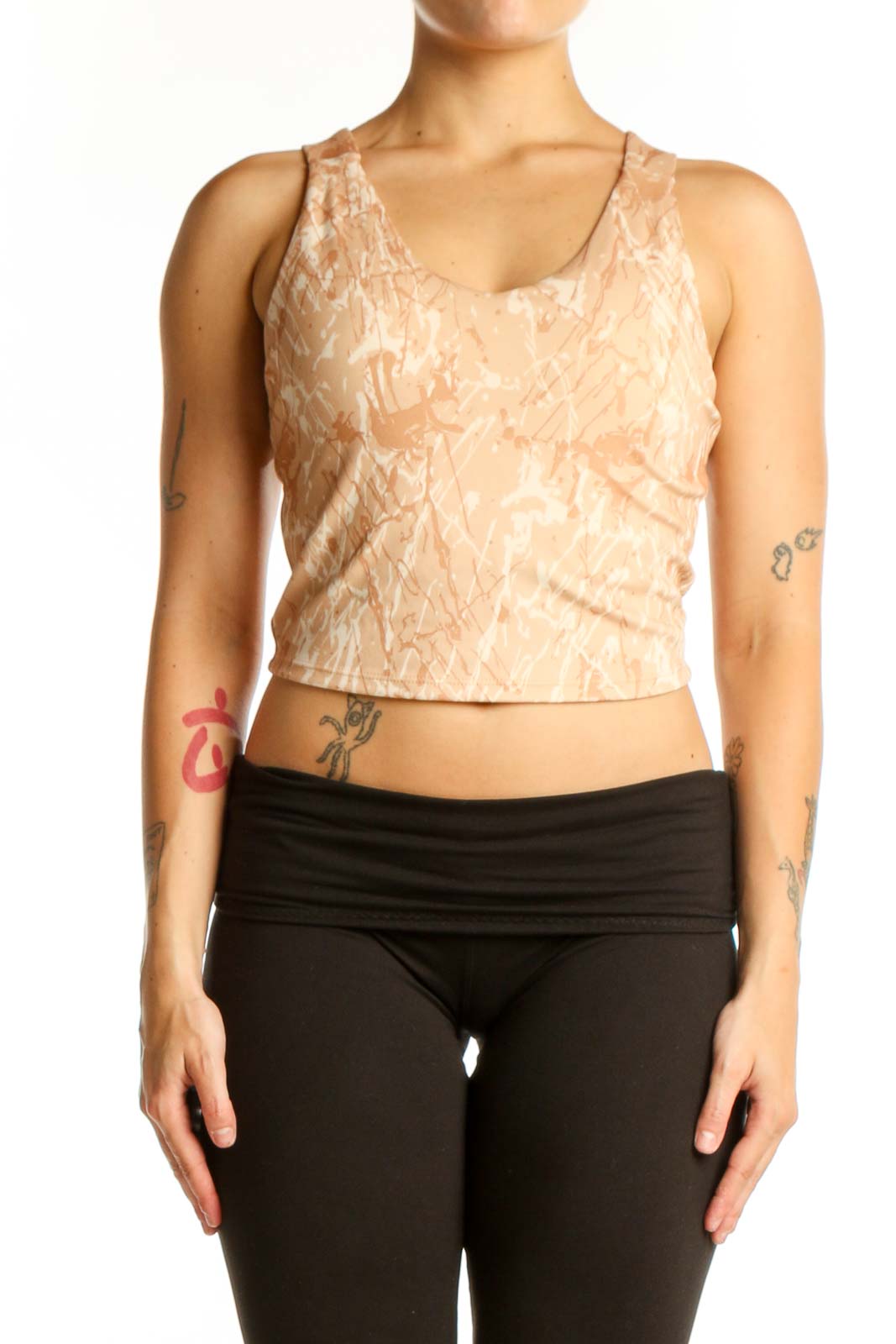 Beige textured crop tank top with scoop neckline, front view on model