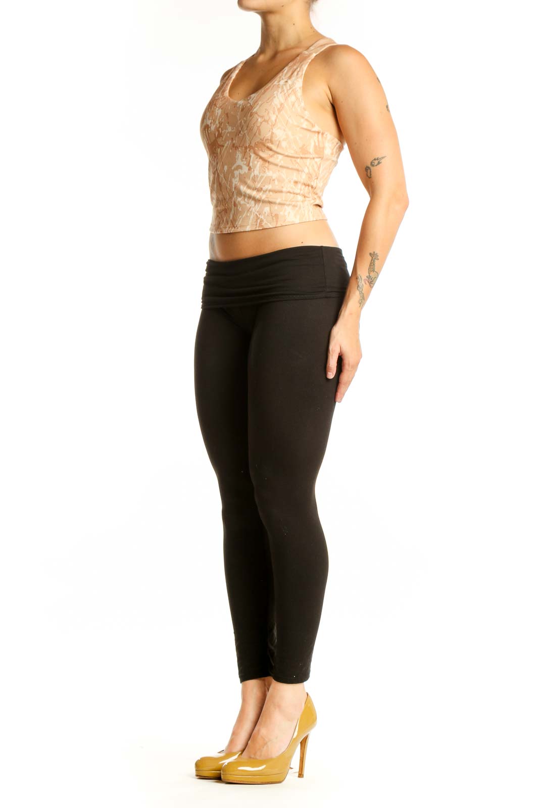 Beige textured crop tank top with scoop neckline, front view on model