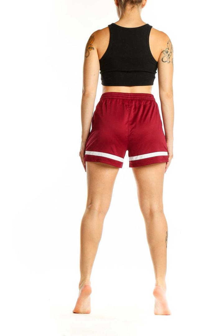 Burgundy Nike athletic shorts back view showing relaxed fit and athletic design