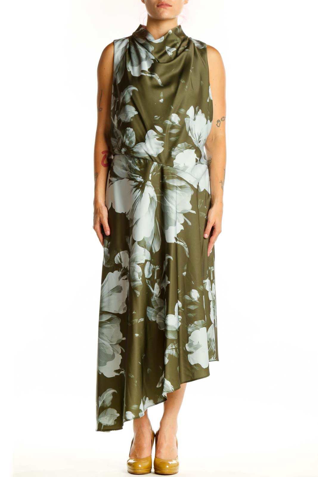 Olive green floral dress with white botanical print, cowl neckline, and asymmetrical hemline by Donna Karan New York