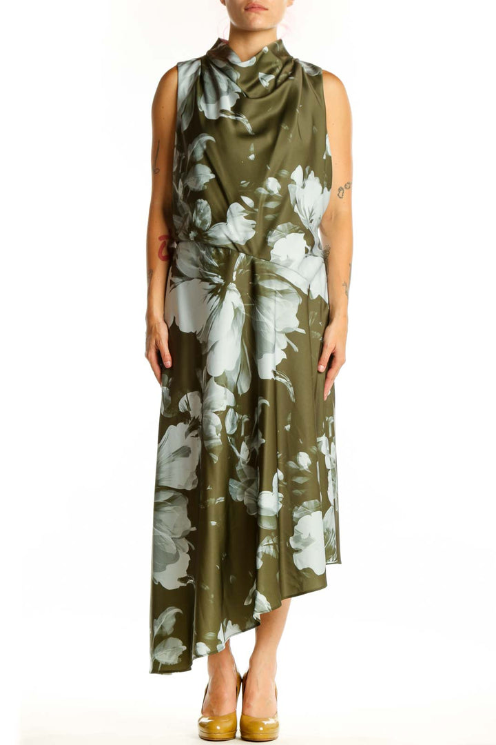 Olive green floral dress with white botanical print, cowl neckline, and asymmetrical hemline by Donna Karan New York