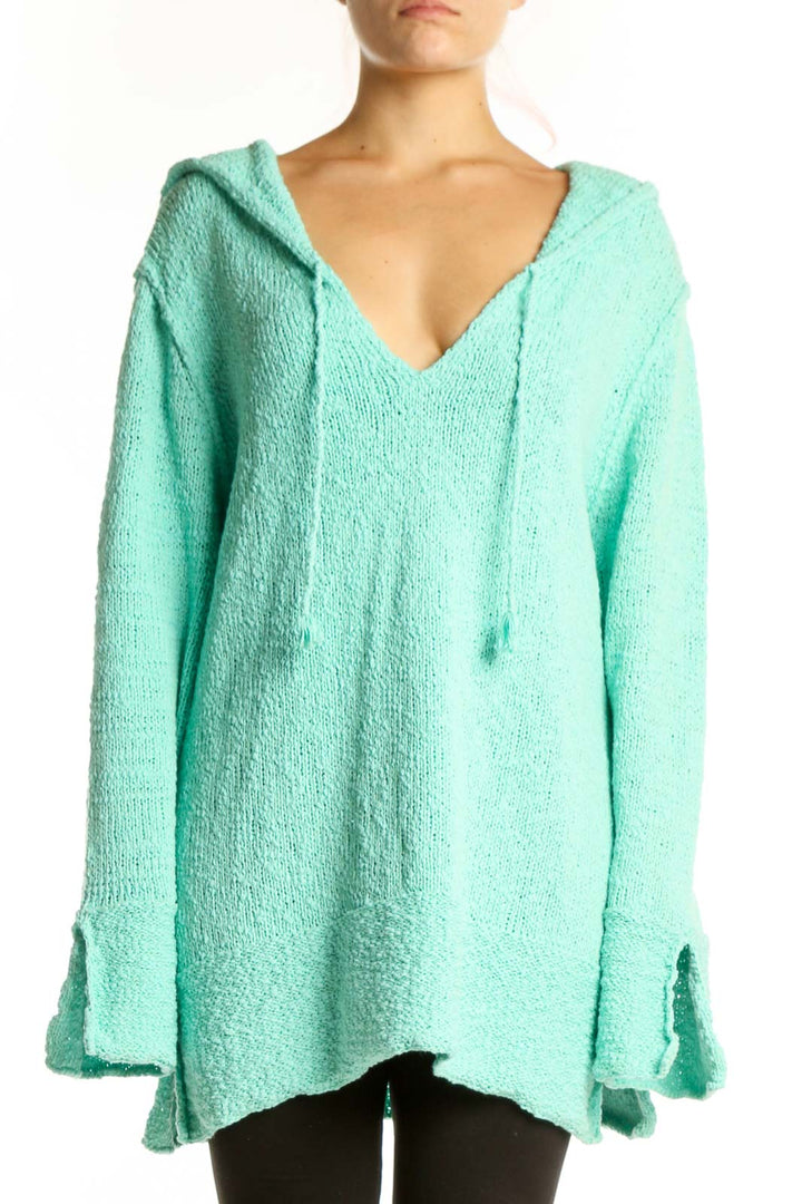 Front view of mint green hooded V-neck knit sweater with textured fabric and oversized fit