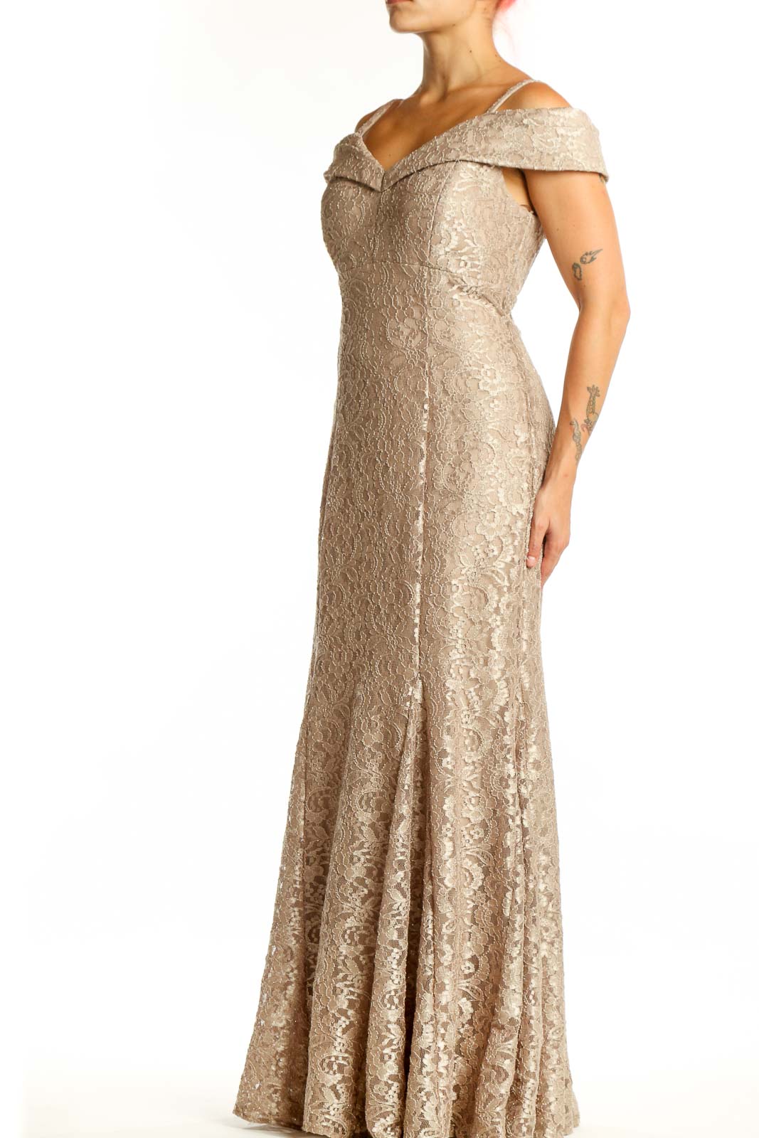 Beige lace off-shoulder mermaid gown with cold-shoulder neckline and intricate floral pattern, front view